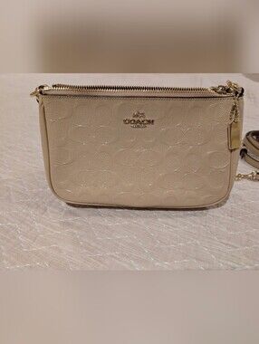 Coach Signature Embossed Leather Wristlet - Light Beige